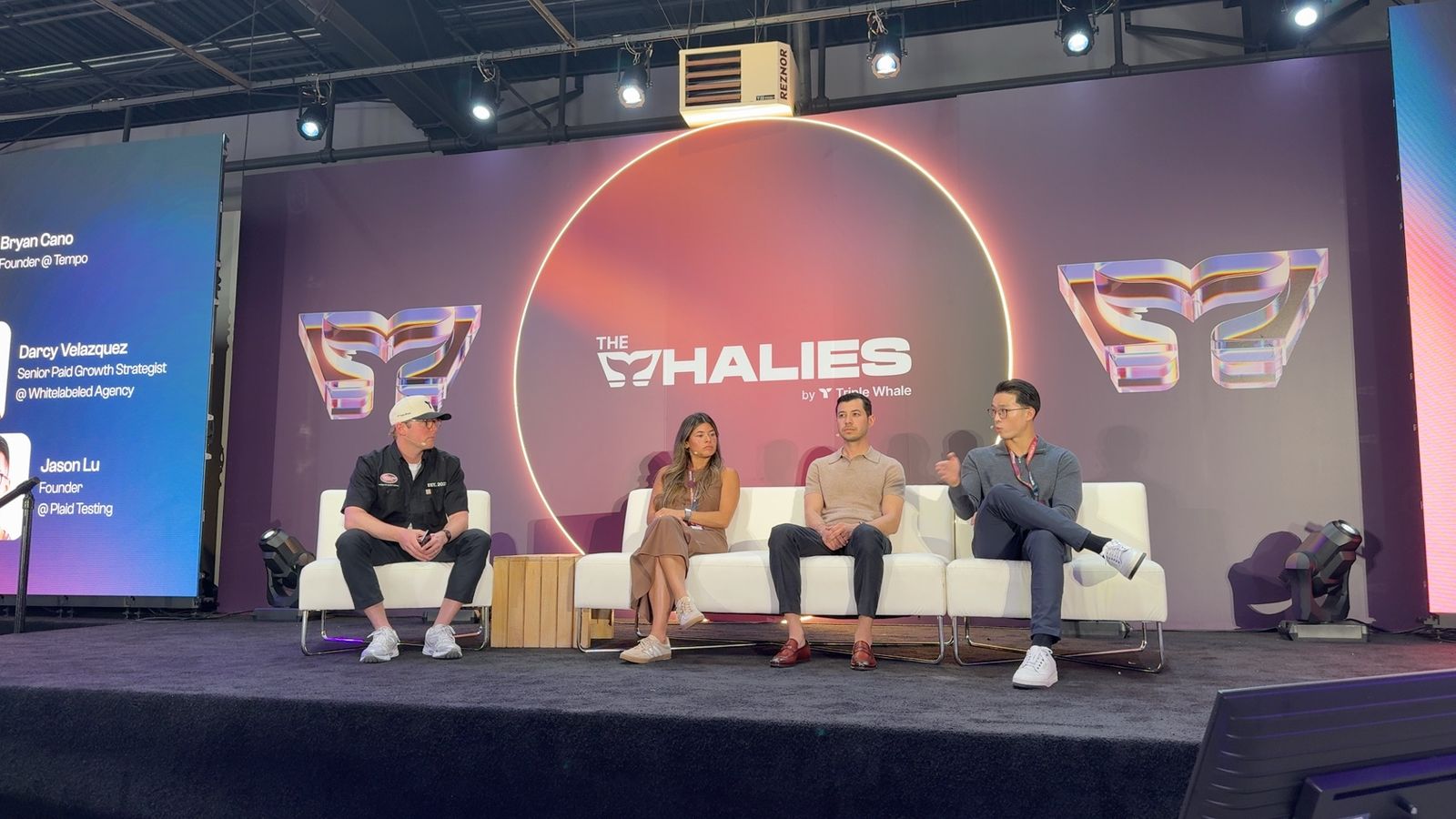 Jason Lu, right, speaking on a panel at The Whalies, the ecommerce conference run by Triple Whale